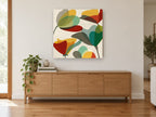 Overlapping Tulip Shapes floral canvas print on the wall of a living room above a sideboard