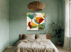 Overlapping Poppy Shapes floral canvas print on the wall of a bedroom