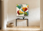 Overlapping Poppy Shapes floral canvas print on the wall of a hallway