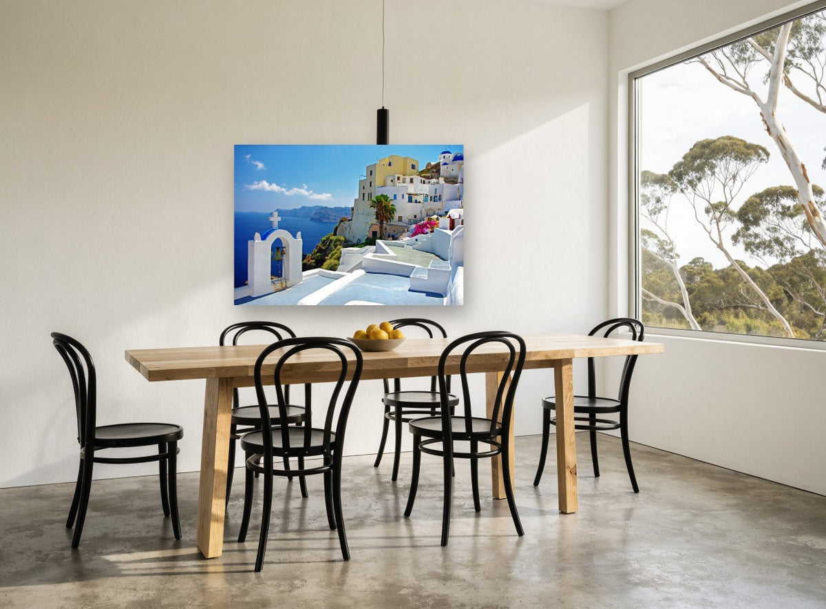 Santorini Bell Tower View coastal canvas print on the wall of a dining room