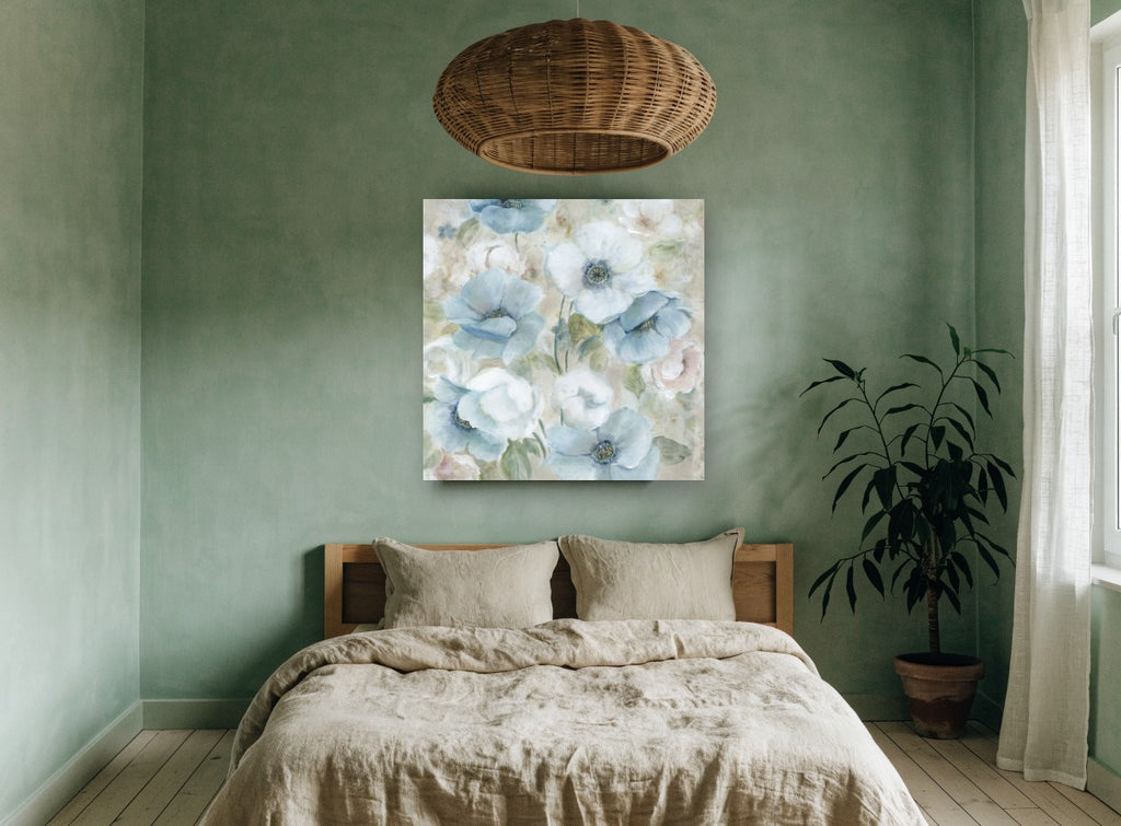 Soft Blue Anemones floral canvas print on the wall of a bedroom