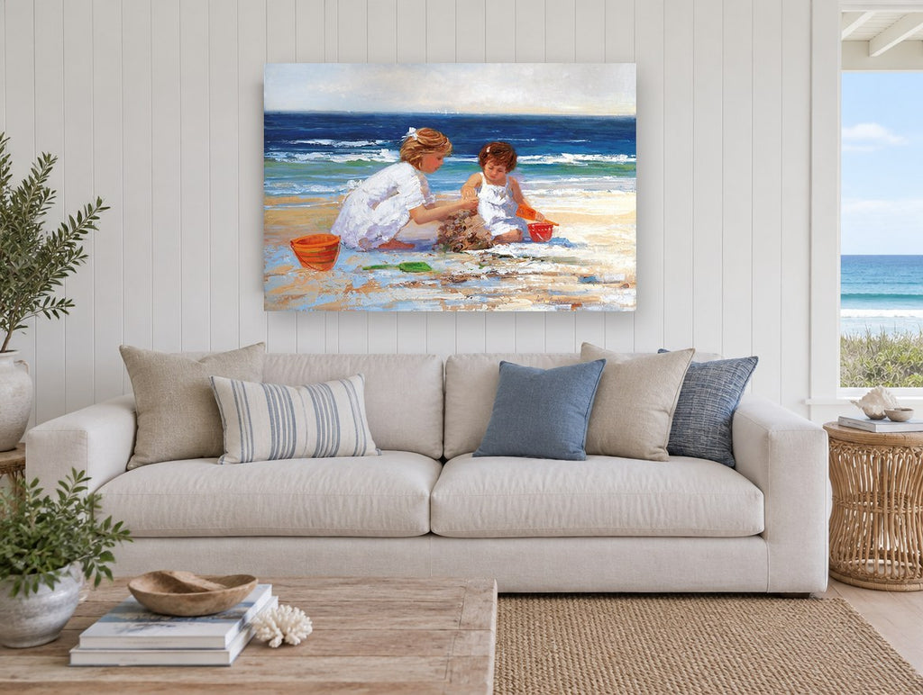 Sandcastle Sisters coastal canvas print on the wall of a beach house living room