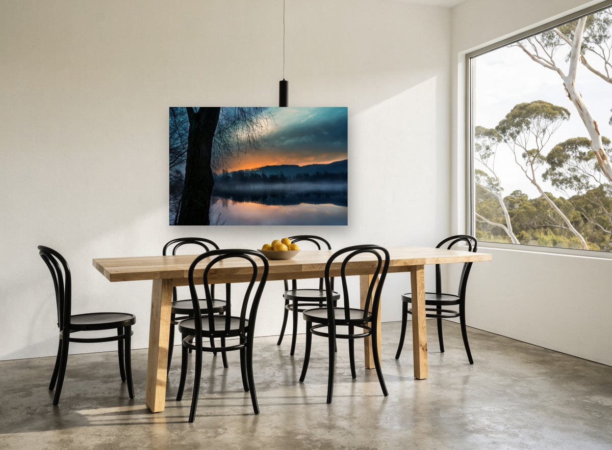 Ember Dawn Over Still Water landscape canvas print on the wall of a dining room