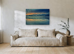 Amber Dawn Mirror landscape canvas print on the wall of a living room