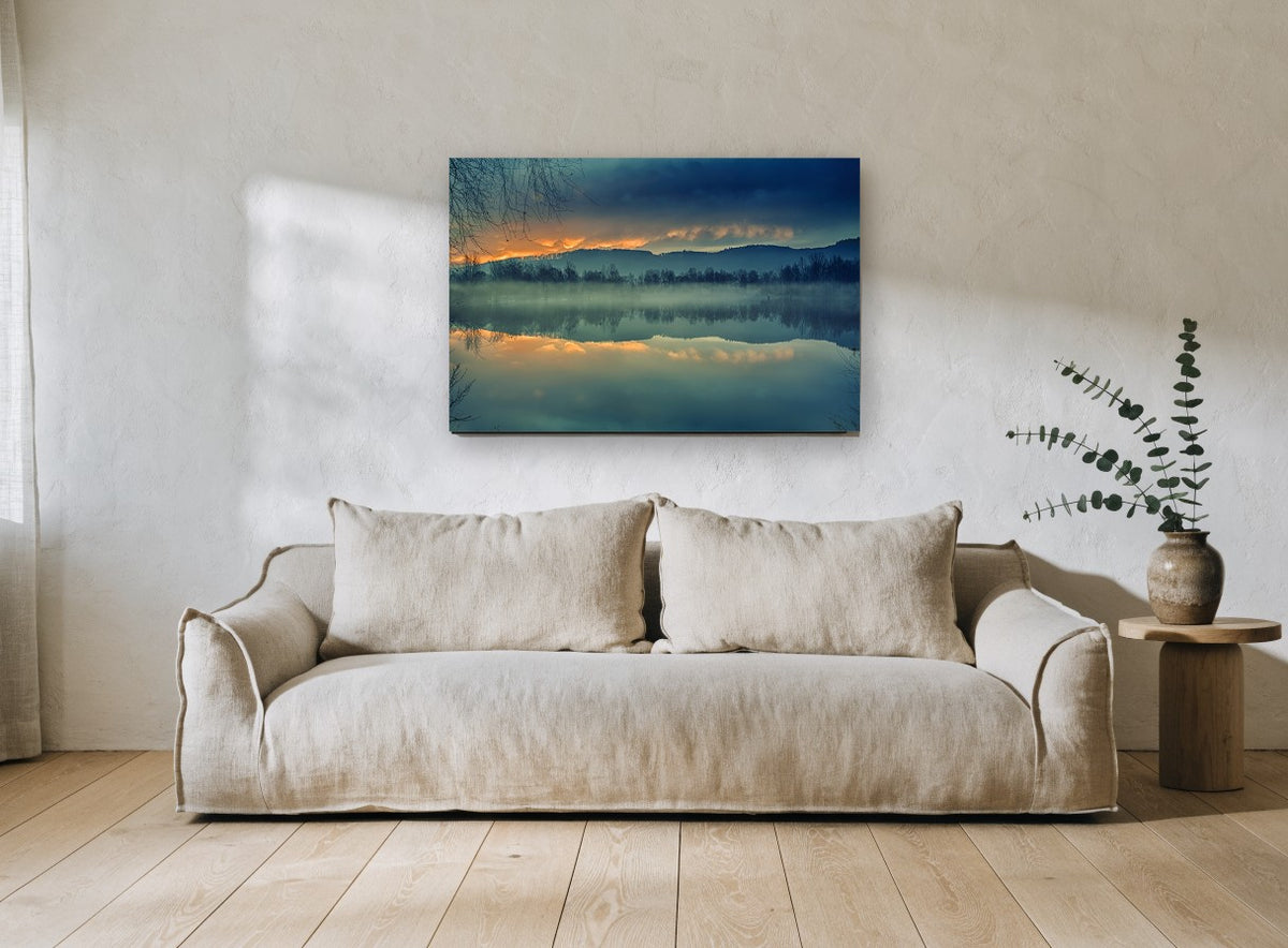 Amber Dawn Mirror landscape canvas print on the wall of a living room