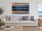 Blue Mist Lakeshore Mirror landscape canvas print on the wall of a beach house living room