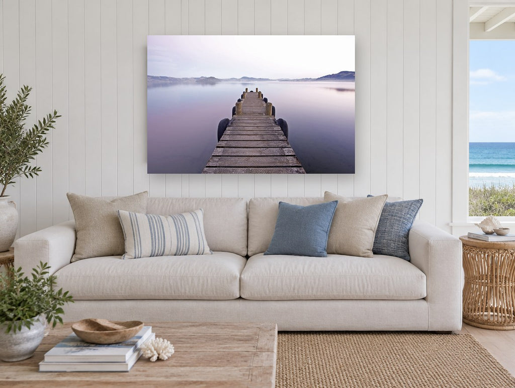 Still Lake Jetty coastal canvas print on the wall of a beach house living room