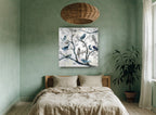 Blue Birds in Branches floral canvas print on the wall of a bedroom