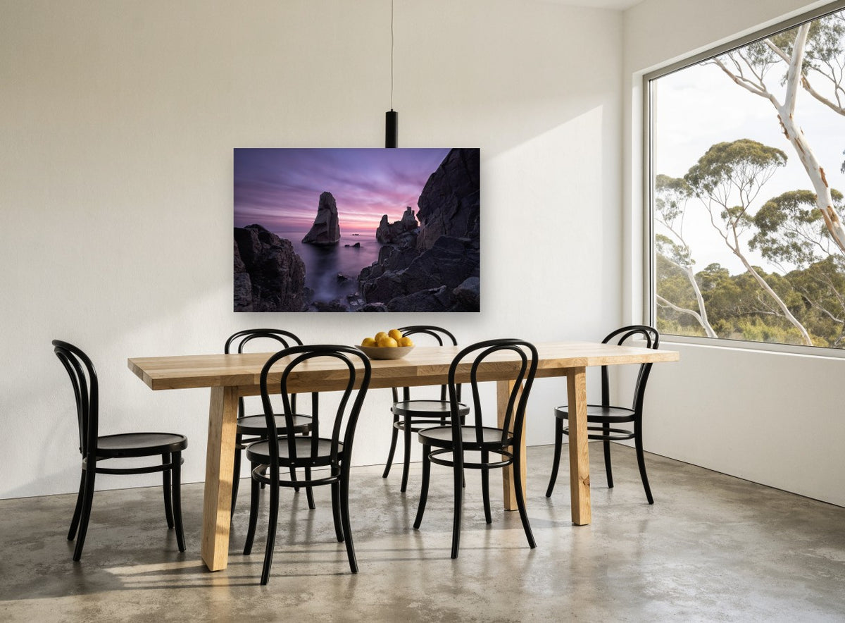 Violet Dawn Sea Stacks coastal canvas print on the wall of a dining room