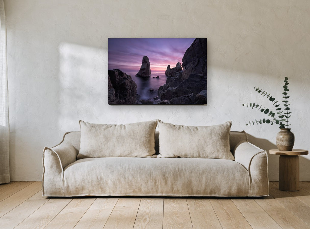 Violet Dawn Sea Stacks coastal canvas print on the wall of a living room