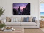 Violet Dawn Sea Stacks coastal canvas print on the wall of a beach house living room