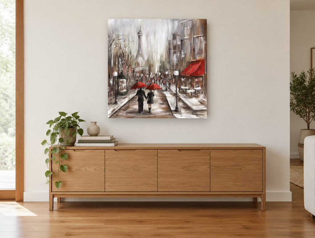Red Umbrellas Paris Cafe city canvas print on the wall of a living room above a sideboard