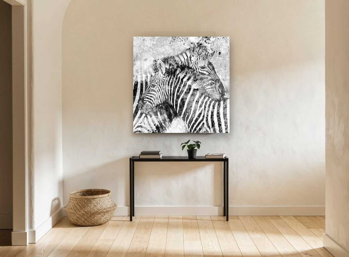 Splattered Zebra Pair animal canvas print on the wall of a hallway