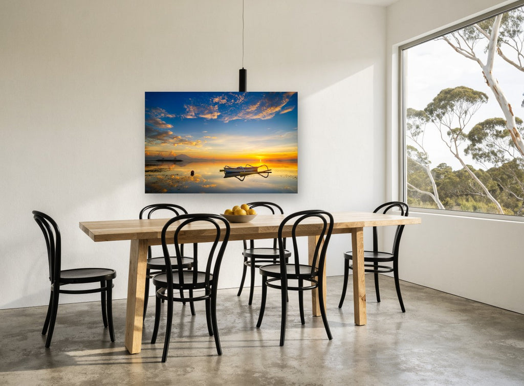 Golden Hour Outrigger coastal canvas print on the wall of a dining room