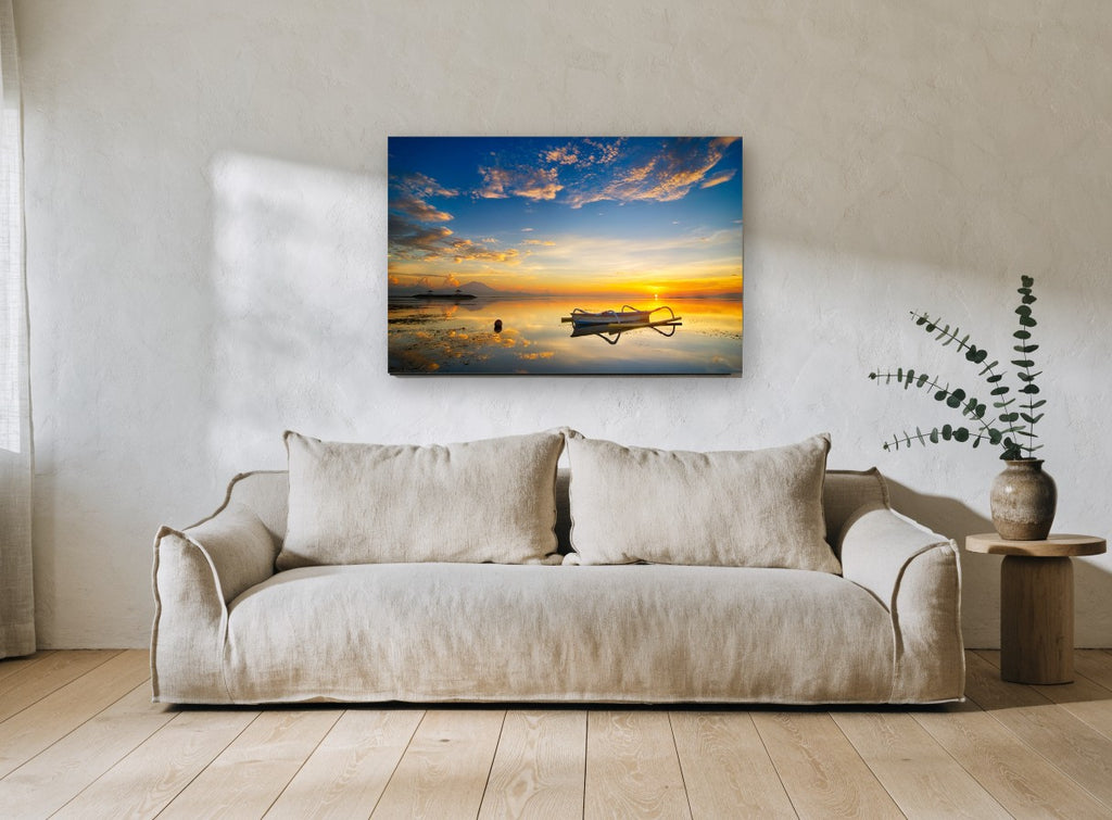 Golden Hour Outrigger coastal canvas print on the wall of a living room