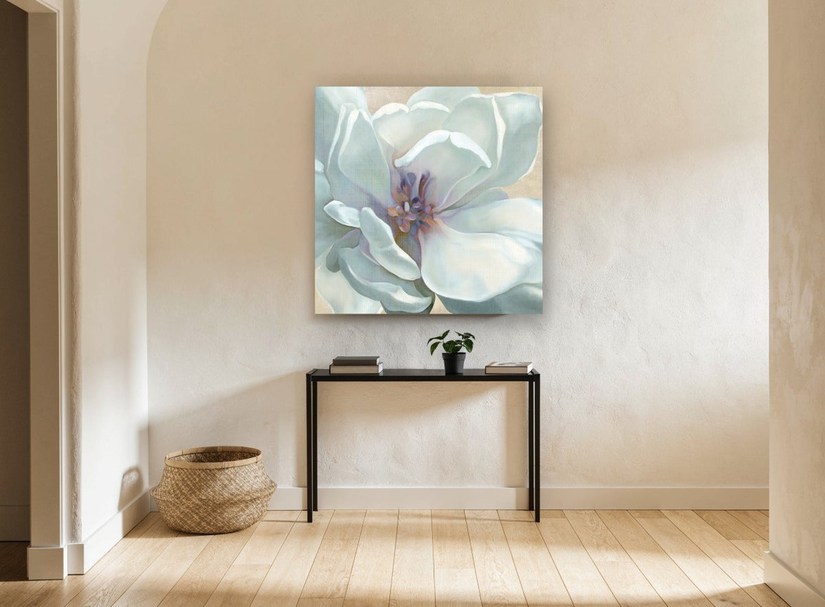 Pale Magnolia Bloom floral canvas print on the wall of a hallway