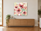 Blush Poppy Meadow floral canvas print on the wall of a living room above a sideboard