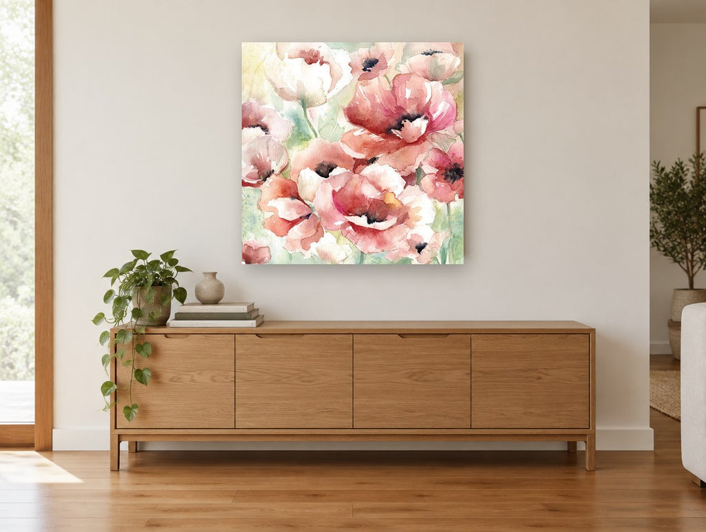 Blushing Poppy Meadow floral canvas print on the wall of a living room above a sideboard