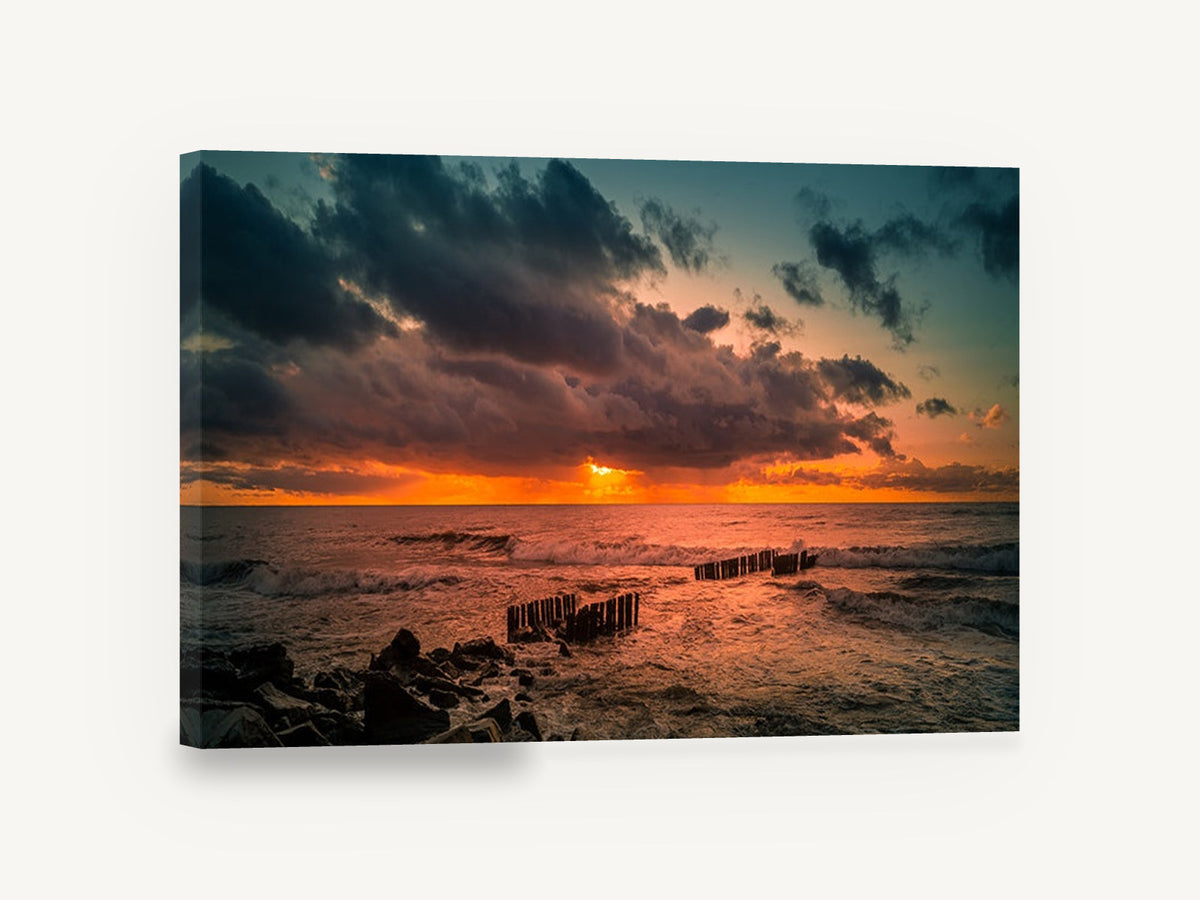 Ember Sky Breakwater, sunset seascape photograph with timber groynes, coastal canvas wall art print ready to hang