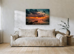 Ember Sky Breakwater coastal canvas print on the wall of a living room