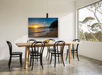 Golden Hour Shoreline coastal canvas print on the wall of a dining room
