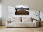 Thatched Jetty Storm coastal canvas print on the wall of a living room