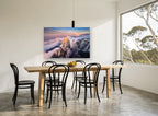 Peaks Above the Clouds landscape canvas print on the wall of a dining room