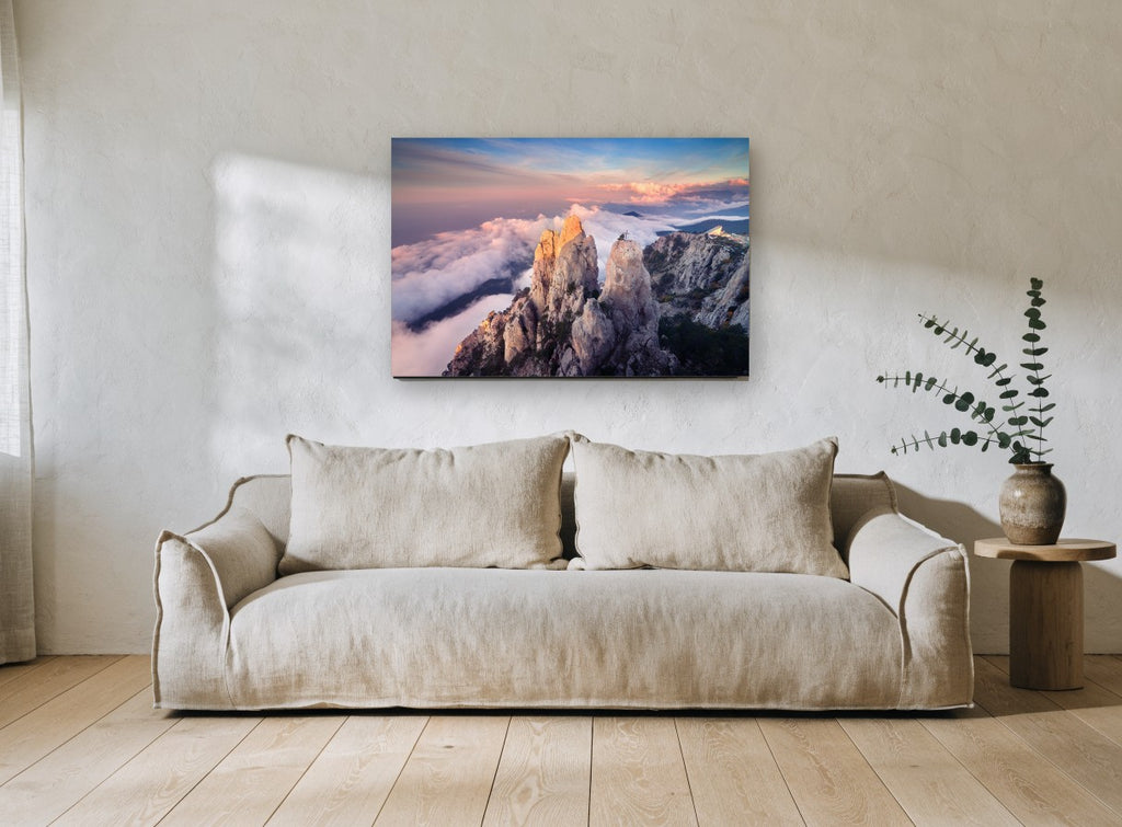 Peaks Above the Clouds landscape canvas print on the wall of a living room