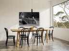Snowbound Park Bridge city canvas print on the wall of a dining room