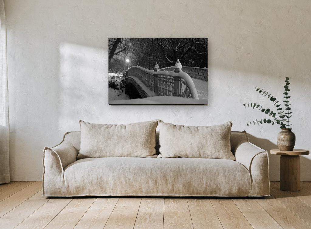 Snowbound Park Bridge city canvas print on the wall of a living room