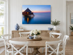 Dusk at the Water Bungalows coastal canvas print on the wall of a Hamptons dining room