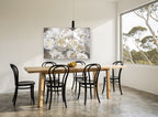 Ivory Gilt Bloom floral canvas print on the wall of a dining room