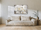 Ivory Gilt Bloom floral canvas print on the wall of a living room