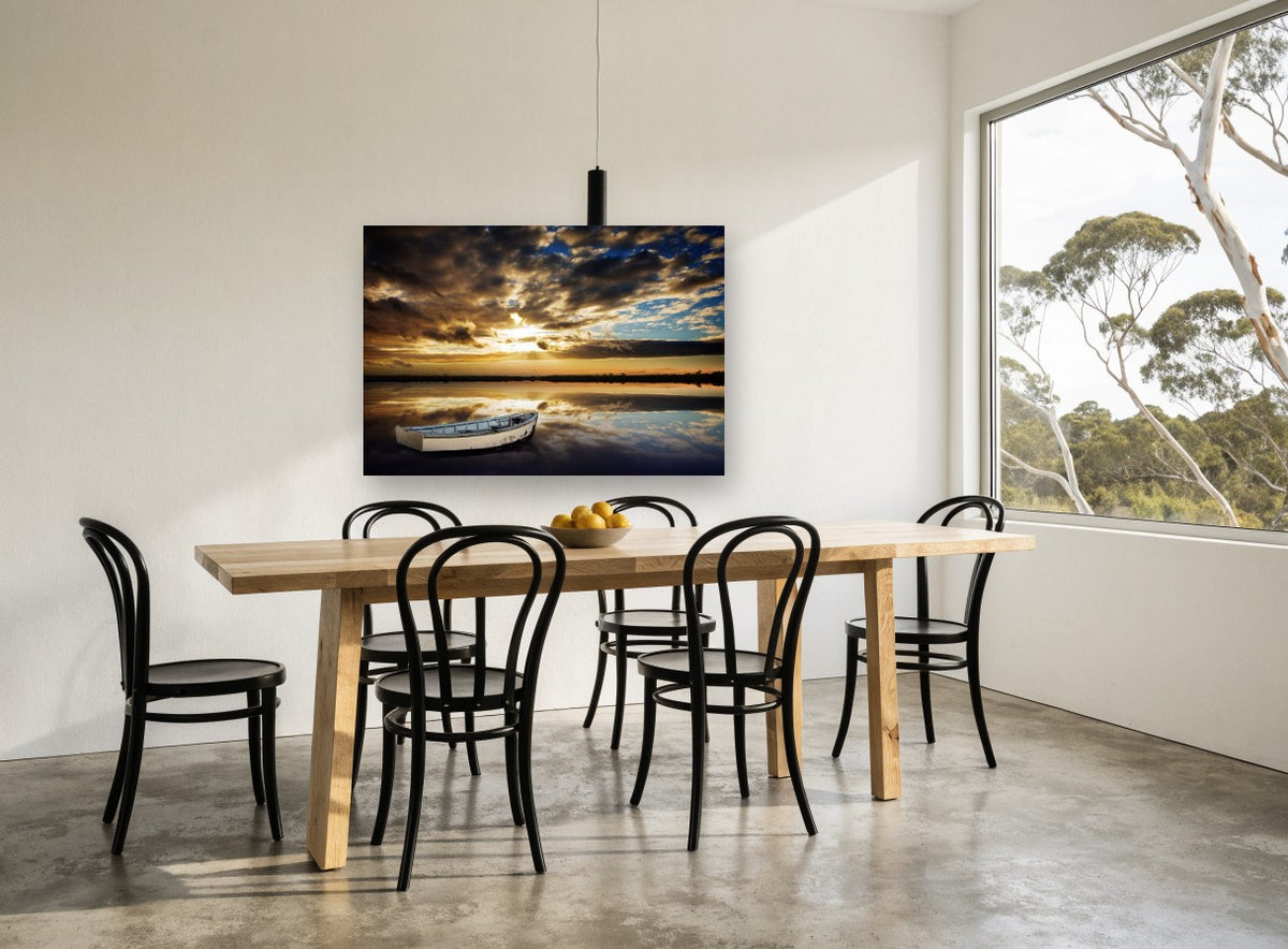 Still Water Dinghy coastal canvas print on the wall of a dining room