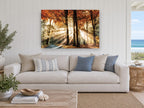 Sunbeams Through Autumn Beeches landscape canvas print on the wall of a beach house living room