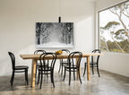 Snowfall Tree Avenue landscape canvas print on the wall of a dining room