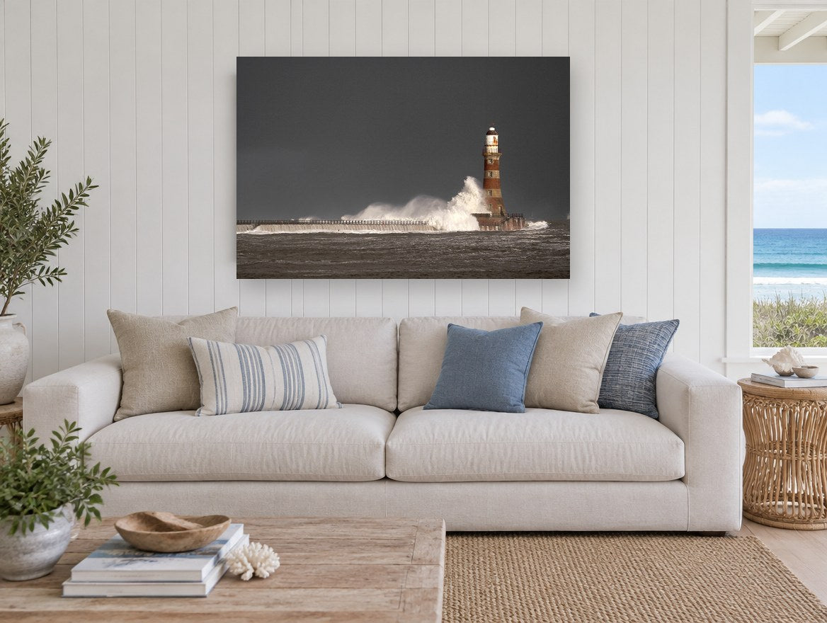 Storm Light Beacon coastal canvas print on the wall of a beach house living room