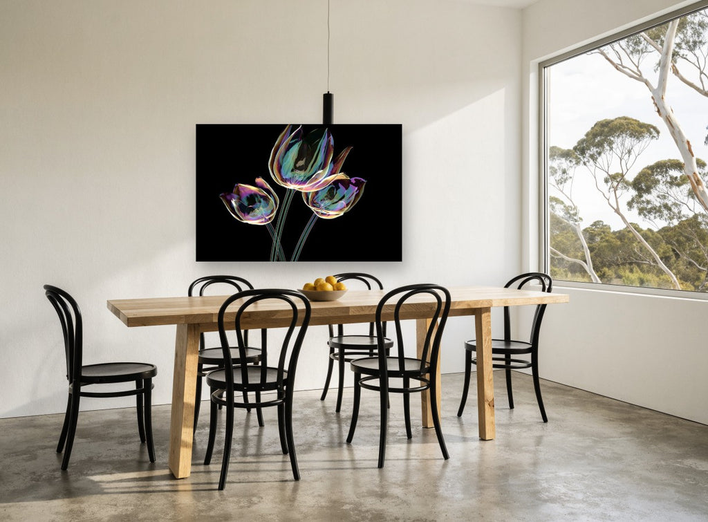 Iridescent Tulip Trio floral canvas print on the wall of a dining room