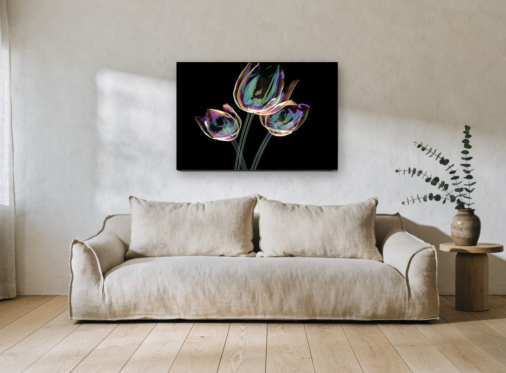Iridescent Tulip Trio floral canvas print on the wall of a living room
