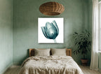 Teal Glass Tulip floral canvas print on the wall of a bedroom
