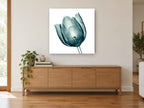 Teal Glass Tulip floral canvas print on the wall of a living room above a sideboard