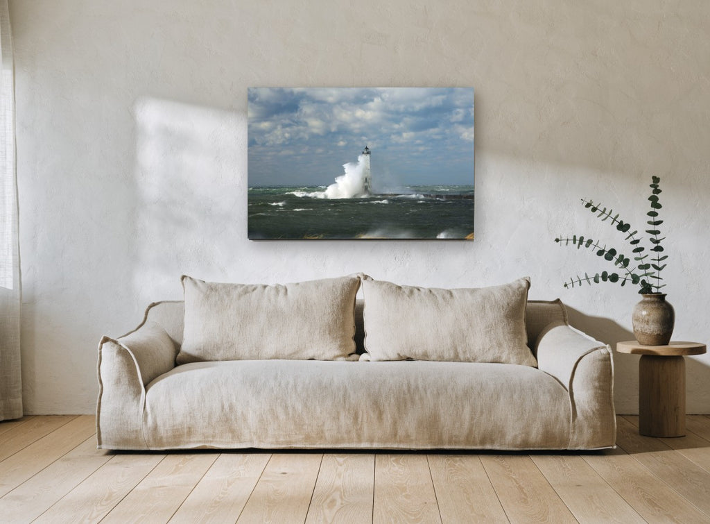 Storm Surge Lighthouse coastal canvas print on the wall of a living room