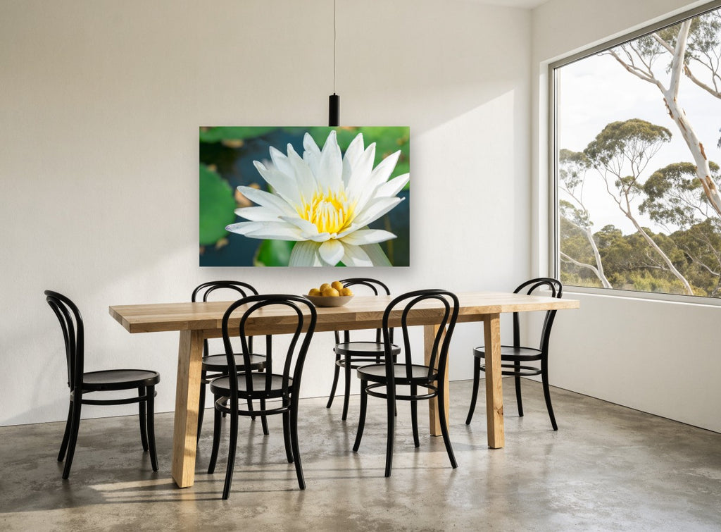 White Lotus Pond floral canvas print on the wall of a dining room