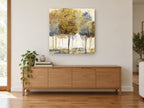 Gilded Grove landscape canvas print on the wall of a living room above a sideboard
