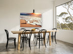 Stacked Stones at Sunset coastal canvas print on the wall of a dining room