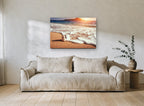 Stacked Stones at Sunset coastal canvas print on the wall of a living room
