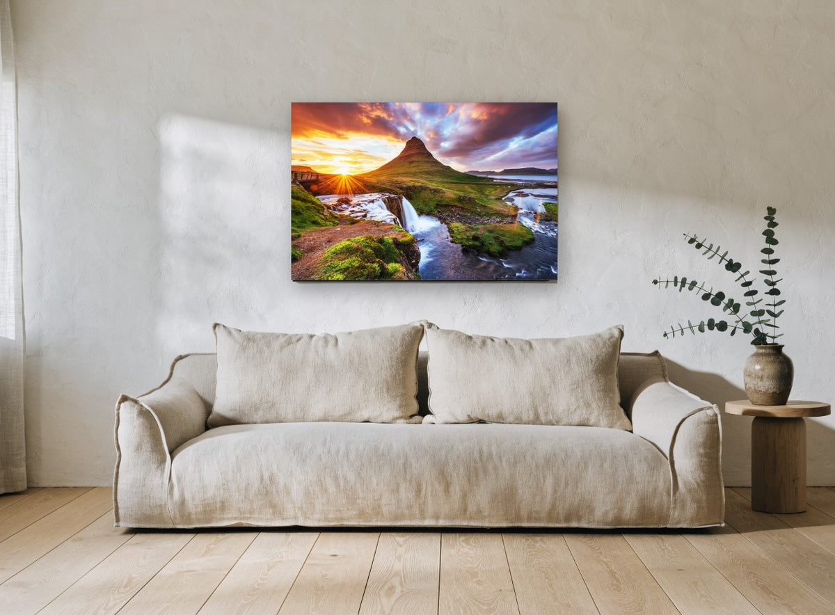 Sunburst Over Green Peak landscape canvas print on the wall of a living room