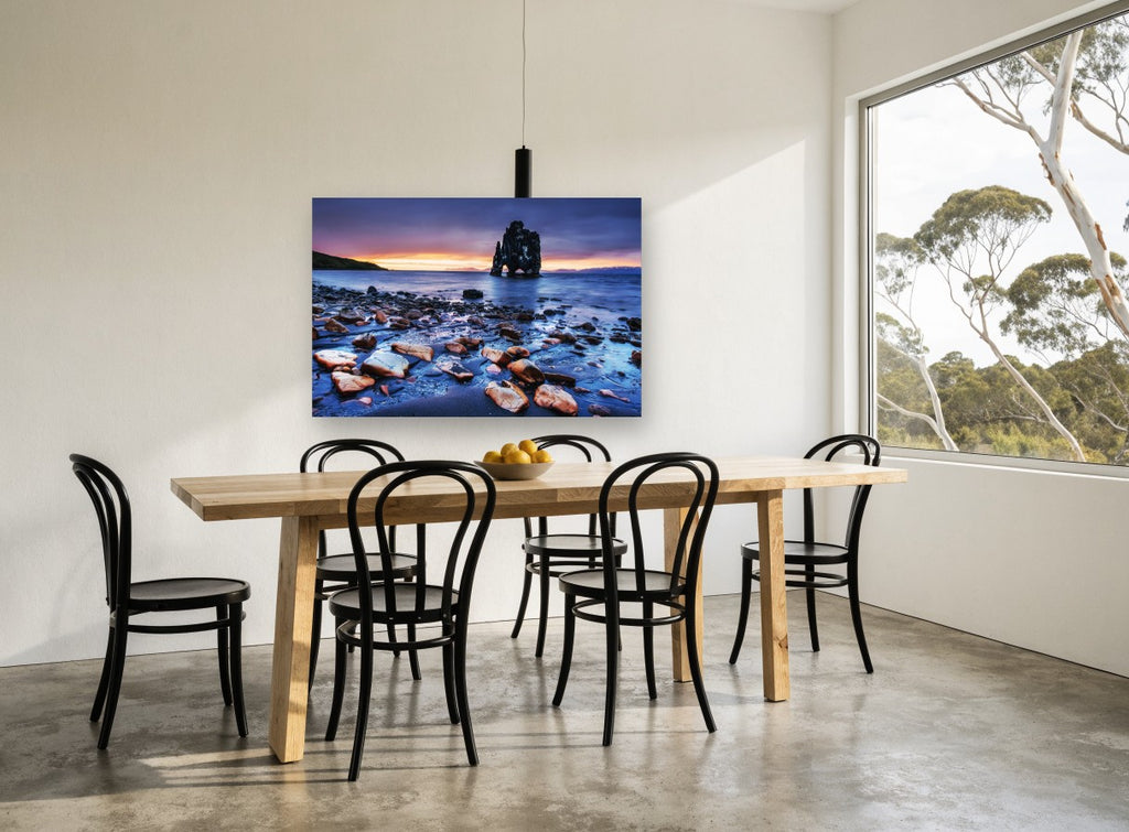 Twilight Sea Stack coastal canvas print on the wall of a dining room