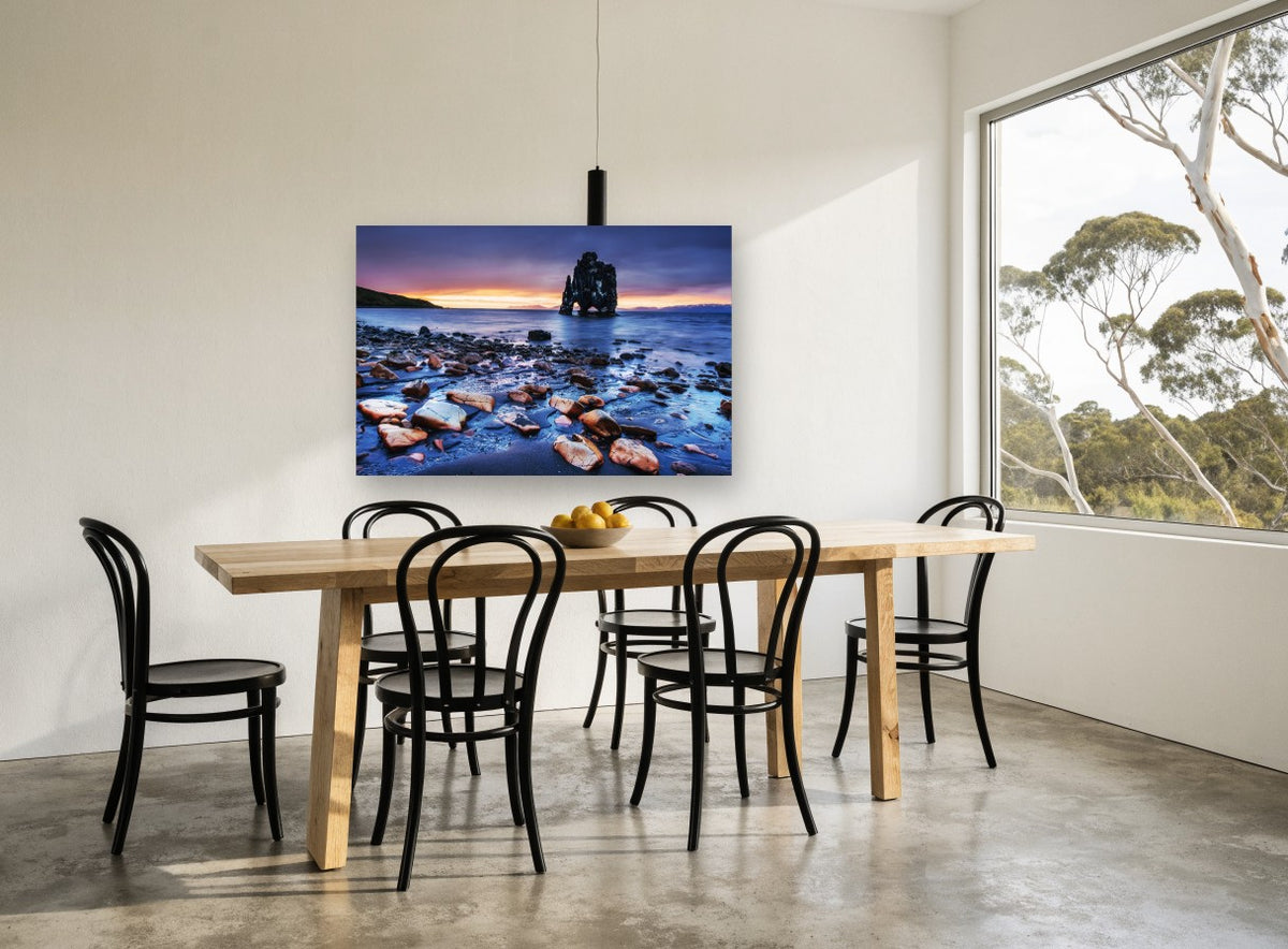 Twilight Sea Stack coastal canvas print on the wall of a dining room