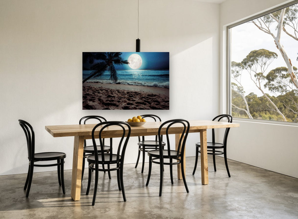 Moonlit Palm Shore coastal canvas print on the wall of a dining room